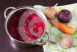 Beet soup and some ingredients to it