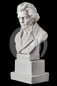 Beethoven statuette isolated on black background
