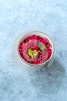 Beetroot Pad Thai Rice Noodles with Beet Flavored and Broccoli in Bowl