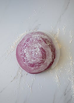 Beetroot Pasta dough in the making against white background