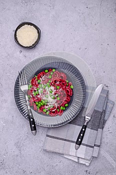 Beetroot pasta with green peas