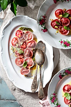 Beetroot ravioli with goat cheese, mozzarella, parmesan, butter sauce