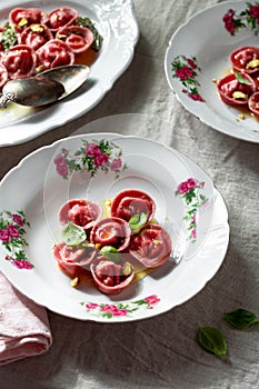 Beetroot ravioli with goat cheese, mozzarella, parmesan, butter sauce