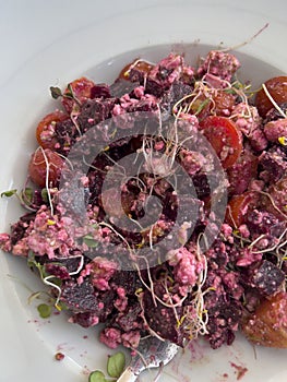 Beetroot salad with feta cheese and sprouts