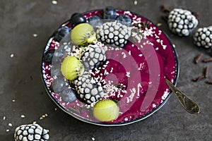 Beetroot smoothie with chocolate, black berries and bluberries