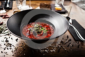 Beetroot soup served in a bowl in restaurant