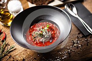 Beetroot soup served in a bowl in restaurant