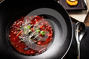 Beetroot soup served in a bowl in restaurant