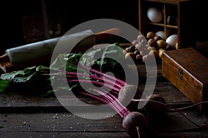 Beets with stems on a wooden table