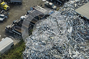 Beg pile of scrap aluminum metal siding from ruined houses after hurricane Ian swept through Florida. Recycle of broken