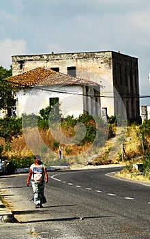 A beggar woman on the border between Montenegro and Albania