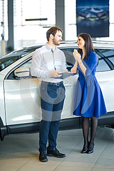 Begging. Please. Young woman praying her husband to buy her a new car