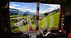 Begin your journey and discover switzerland with famous traditional swiss railway train wander thru majestic alpine scenery