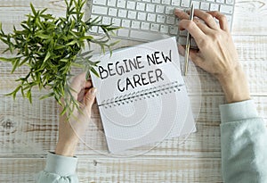 begine new career. text on white paper on wooden background