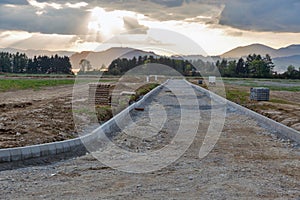 Beginning of the construction of a cottage town street