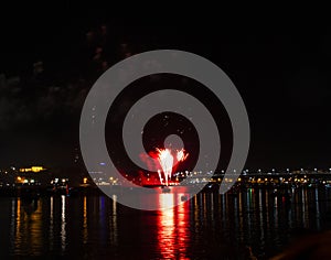 The beginning of the fireworks from the barge on the Volga river