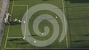 The beginning of a football match and scoring a Goal. Aerial shot of a football match the view from the top