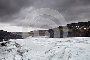 The beginning of the SÃ³lheimajÃ¶kul glacier in Iceland