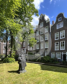 Beguin statue in the Begijnhof in Amsterdam