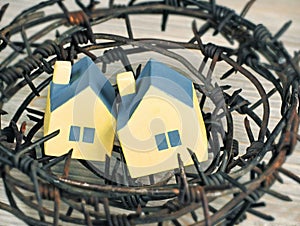 Behind a barbed wire