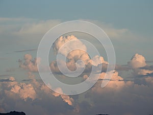 Behind this big cloud of rain and storm, the sun seems to want to return