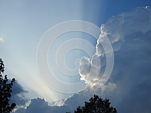 Behind this big cloud of rain and storm, the sun seems to want to return