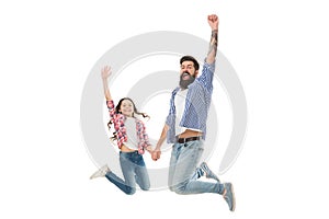 Behind every great daughter is a truly amazing dad. Happy father and little daughter jumping with joy. Bearded man and