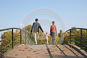 Behind family with baby