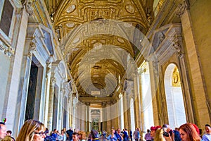 Tourists sightseeing St. Peter`s Basilica narthex Vatican