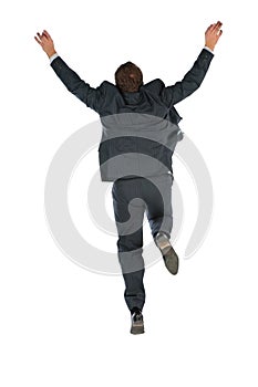 Behind jumping businessman