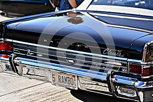 Behind shot of an old-fashioned black classic Rambler car in Downers Grove, United States