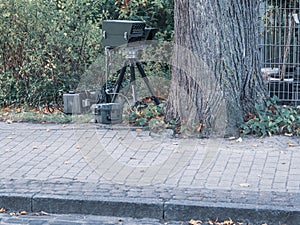 Behind the tree is radar trap for speed monitoring