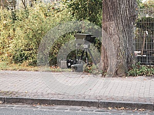 Behind the tree is radar trap for speed monitoring