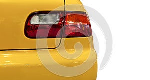 Behind view tail light yellow car isolated on white background with clipping path