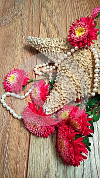 Starfish with flowers and pearls