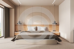 Beige bedroom interior with cozy bed