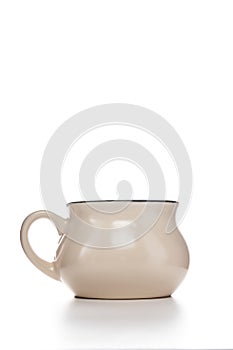 Beige bowl for soups and liquids on white isolated background