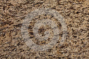 Beige, brown granite texture floor panel background.