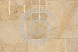 Beige colored tiles close up