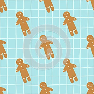 Beige cookies in gingerbread man shapes seamless doodle pattern. Winter stylized bakery tasty print on blue chequred background