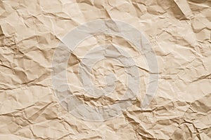 Beige crumpled paper wrinkled texture background