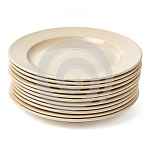 Beige dinner plates stacked neatly isolated photo
