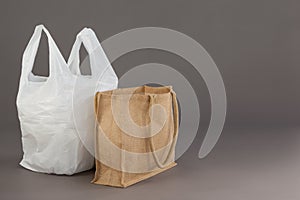 Beige fabric bag and white plastic bag