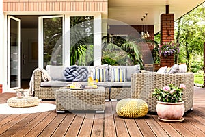 Beige garden furniture on terrace photo