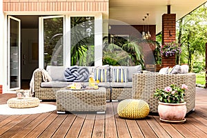 Beige garden furniture on terrace