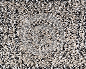 Beige heather boucle fabric made of wool fibres textured background.