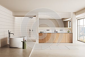 Beige hotel bathroom interior with tub, double sink and shower. Panoramic window