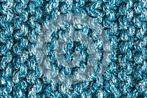 Beige Knitted Background. Blue cyan knitting wool, Netting, Knitwork. Copy space. Hobby concept