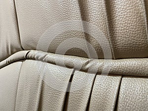 Beige leather background .