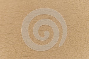Beige leather background . Beige leather texture .